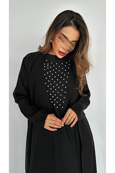 outline Pearl abaya with attached dress and distinctive veil