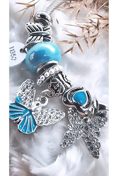 Serenity سوار نسائي من الفولاذ بحجر الزركون الأزرق وسحر الفراشة المزدوجة