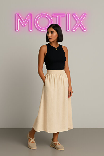 motix Doğal Şıklığın Simgesi: krem Renk Salaş Kesim Midi Etek