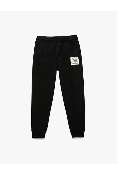 Koton Pantaloni de sport Jogger cu detaliu aplicat și buzunare