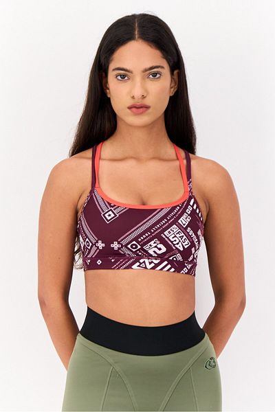 Reebok حمالة صدر رياضية غير مبطنة للنساء للتدريب، لون عنابي