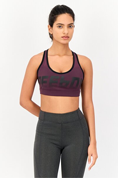 Reebok حمالة صدر رياضية مبطنة بشعار العلامة التجارية للنساء، متعددة الألوان