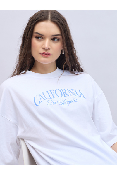 Styli Slogan Print Oversized T-Shirt and Flared Leggings Co-Ords