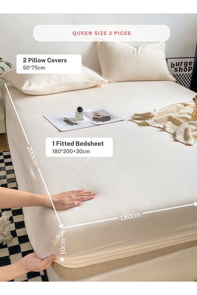 LUNA HOME 3-Piece Set: queen-size fitted bedsheet and two pillowcases, washable cotton in a milky white color.