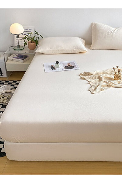 LUNA HOME 3-Piece Set:single-size fitted bedsheet and two pillowcases, washable cotton in a milky white color.