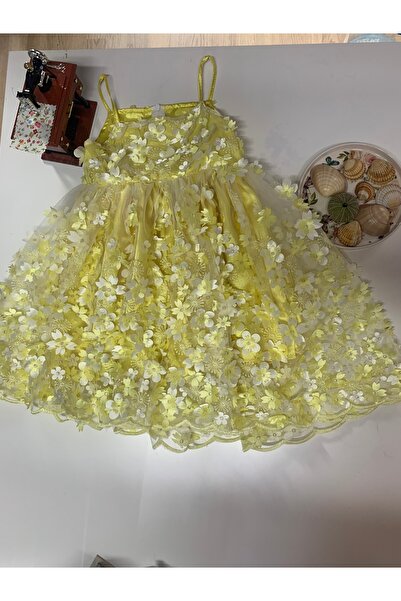 elego Sarı Çiçekli Elbise