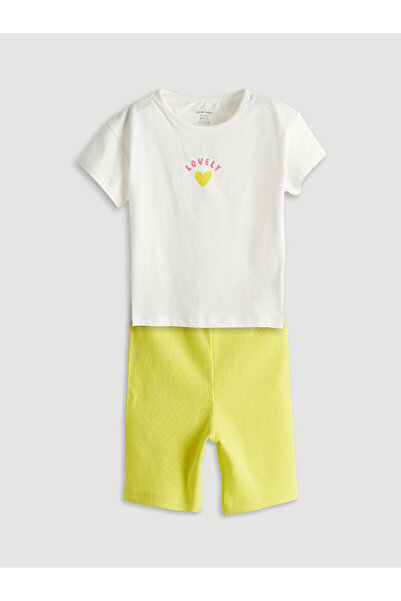 LC Waikiki تي شيرت وبنطلون ضيق للفتيات الصغيرات من بيك نيو سيزون بطبعة قلب، ط...