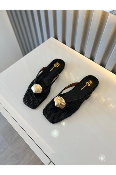 M&B Icon of Elegance: Straw Slippers with Gold Shell Detail 36 and 43 Are Large Numbers