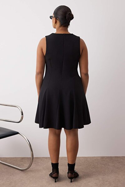 Trendyol Curve Μίνι υφαντό φόρεμα με μαύρο φιόγκο σε γραμμή Α/με ανοιχτή μέση TBBAW26AH00007