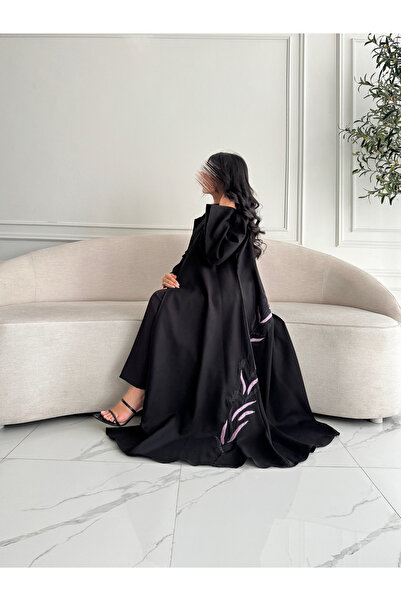 outline Black abaya package made of Lemar fabric with floral embroidery and a dress underneath the abaya