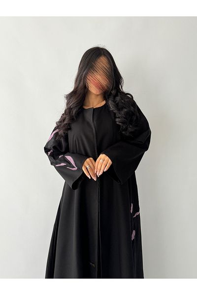 outline Black abaya package made of Lemar fabric with floral embroidery and a dress underneath the abaya