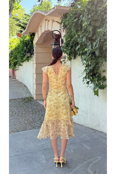 Nesil Desenli Eteği Fırfırlı Midi Boy Kadın Elbise