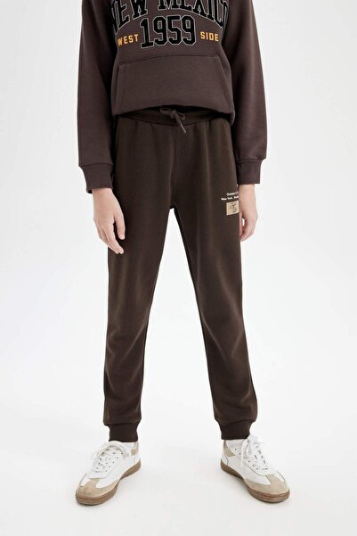 DeFacto Erkek Çocuk Beli Paçası Lastikli Cepli Baskılı Jogger Eşofman Altı C9778A824WN