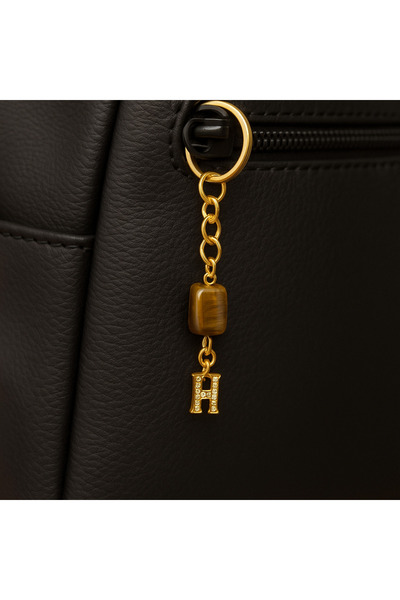 Han Ticarethane سلسلة مفاتيح عين النمر على شكل حرف H من الحجر الذهبي اللون