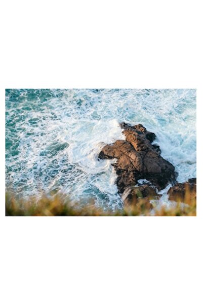 OEM Tablou Canvas, 'Stanca singuratica imbratisata de valuri', 100 x 70cm