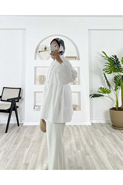 unika boutique قميص نسائي بتفاصيل أزرار محتشمة