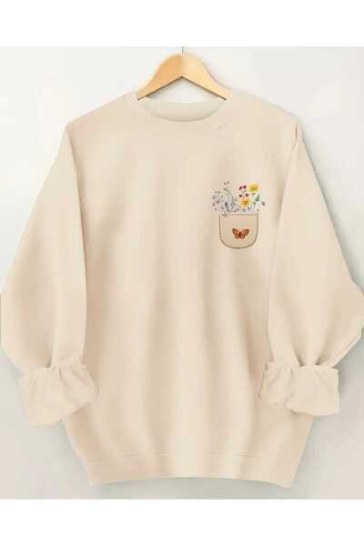 caddekombin سويت شيرت بيج برقبة دائرية وطبعة على شكل زهرة