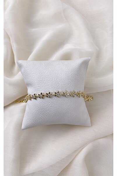 Sacha Accessories Gold Bracelet with Flower Figure and Stone Detail