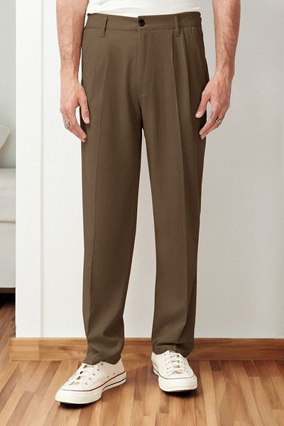 Trendyol Collection Μπεζ πλισέ κλασικό φαρδύ υφασμάτινο παντελόνι TMNSS24PL00024