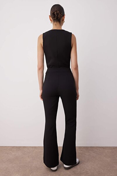 Trendyol Collection Schwarze, ausgestellte, gewebte Hose mit Bootcut-Schnitt TOFAW19BB0581