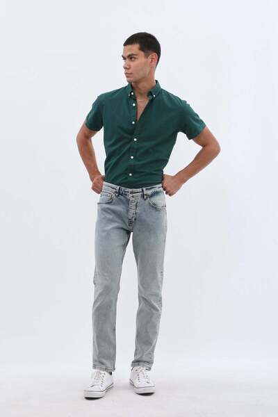 Jeanspro بنطال جينز بقصّة Slim Fit - أزرق فاتح مغسول