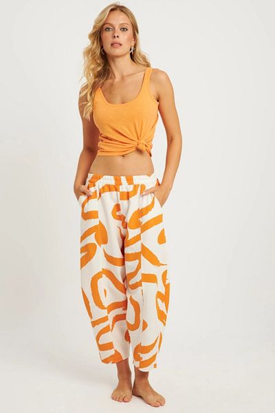 Cool & Sexy Dámské pytlovité kalhoty Ecru-Orange se vzorem - K1253