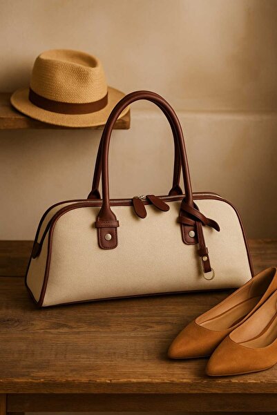 süter حقيبة كتف نسائية بمظهر قش - تفاصيل عنابي