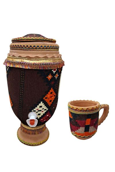 Generic Pottery jar with spout decorated with traditional patterns