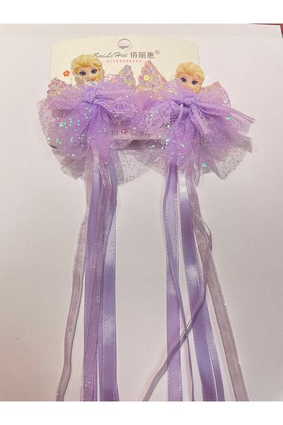 La She Accessories Elsa figure with angel wing detail, long ribbon, 2 clip-on hairpins.