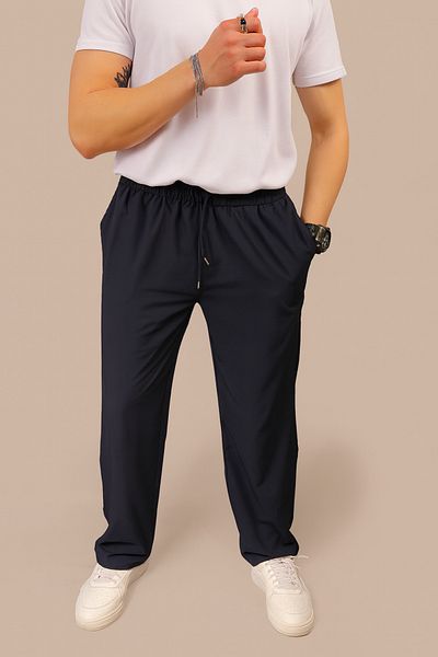 INFLUYENTE Men's Baggy Style Relaxed Fit Parachute Fabric Elastic Waist Wide Leg Trousers