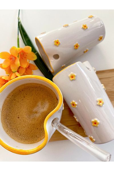 woness studio Handmade Yellow Flower Motif Ceramic Mug with Straw