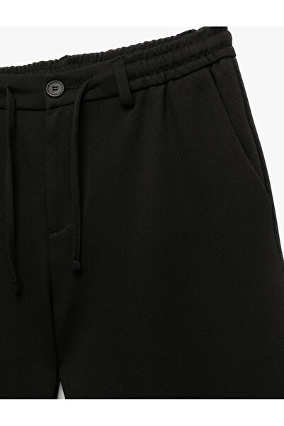 Koton Beli Bağcıklı Düğmeli Pike Kumaş Cep Detaylı Duble Paça Slim Fit Pantolon