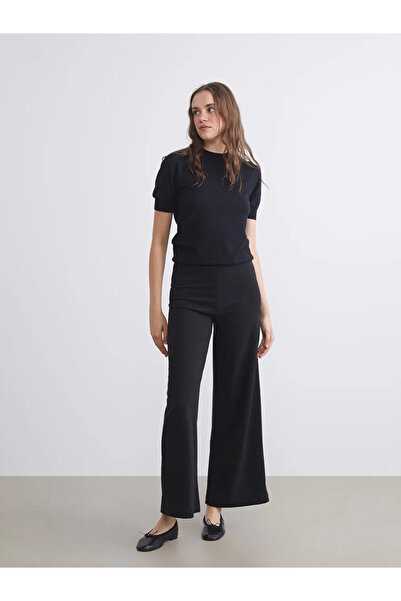 LC Waikiki بنطال نسائي واسع الساق بخصر مطاطي أسود من LCW Modest