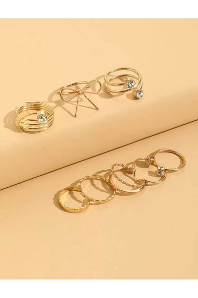 La Saade Golden Glow Touch Set- Gold 8 Piece Adjustable Bow Multi Ring Set with Stones