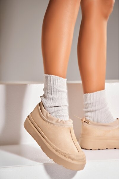 Joana Γυναικείες μπεζ μπότες με επένδυση γούνας από οικολογικό σουέτ σε χρώμα...