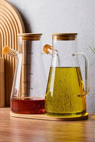 Dekorasyaa طقم من 2 أواني زجاجية للزيت مع غطاء من الخيزران سعة 900 مل