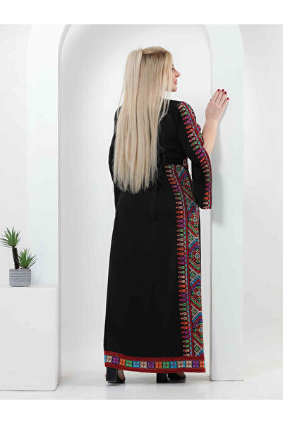 AFandina A Saudi jalabiya embroidered with colors that reflect the nation's heritage. A-72