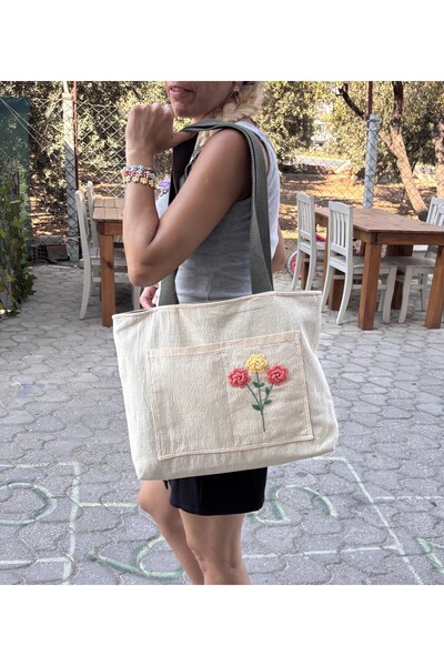 Handream حقيبة كتف من القماش الكريمي مع جيب أمامي على شكل زهرة اللؤلؤ