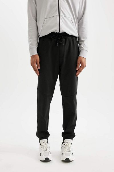 DeFacto Pantaloni de sport Skuba Jogger negri - Buzunar Fermar, țesătură de scufundări, croială obișnuită - D1896ax24au