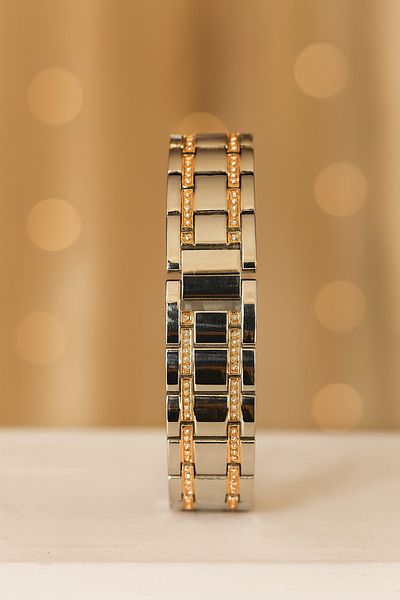 Goldpower Unisex Luxury Metal Wristwatch with Sim and Stone Detail