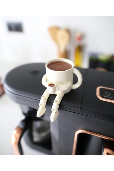 kadan enerji ve güvenlik sistemleri Oturan Kahve Fincani