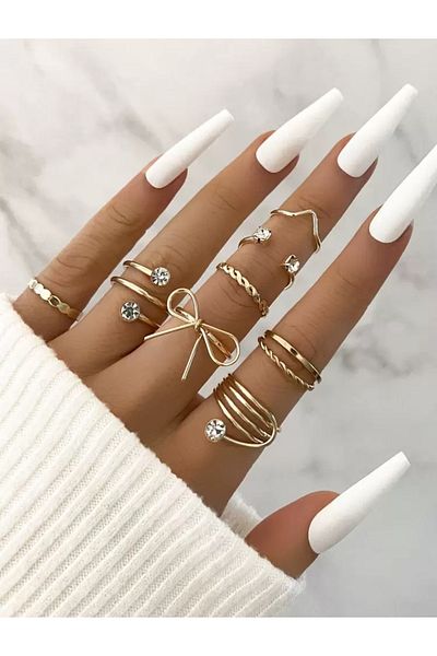 La Saade Golden Glow Touch Set- Gold 8 Piece Adjustable Bow Multi Ring Set with Stones