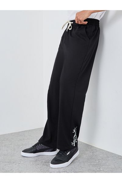 Styli Woven Relaxed Fit Joggers with Graphic Print