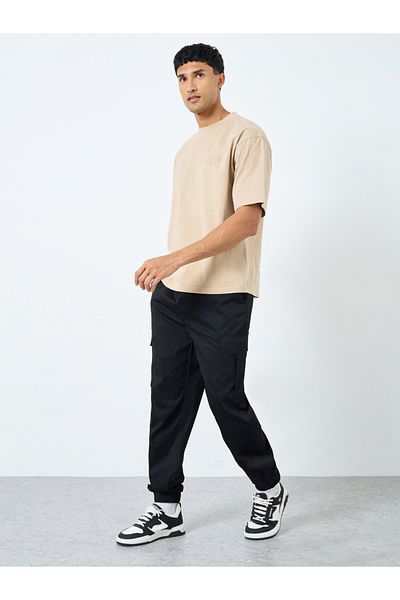 Styli Woven Oversized Cargo Joggers with Cuffed Hem and Badge