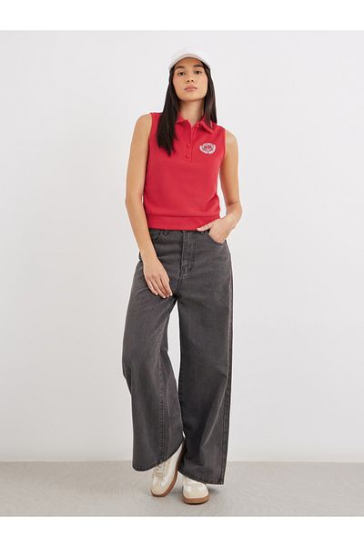 Styli Embroidered Sleeveless Knit Polo Neck Top