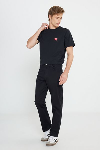 WRANGLER بنطال مطاطي من القطن الأسود للرجال ذو قصة عادية وخصر عادي وساق مستقيمة من تكساس
