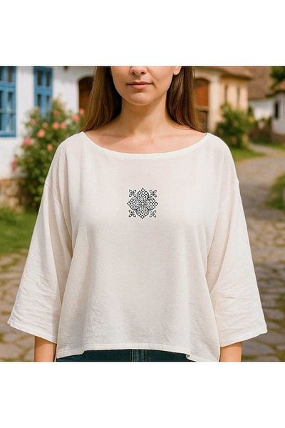 Tela Cotton blouse with ethnic-inspired embroidery