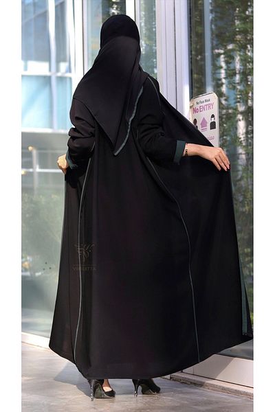 outline Black daily abaya with Arabian Nights fabric and olive green hem