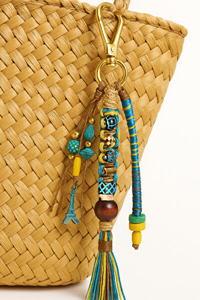 She Sells حقيبة مصنوعة يدويًا باللونين الأصفر الفيروزي والبني مع سلسلة مفاتيح...