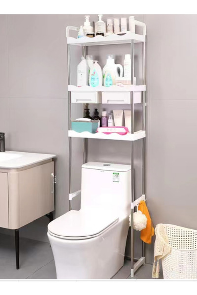Un رف حمام فوق المرحاض بمساحة تخزين متعددة الطبقات